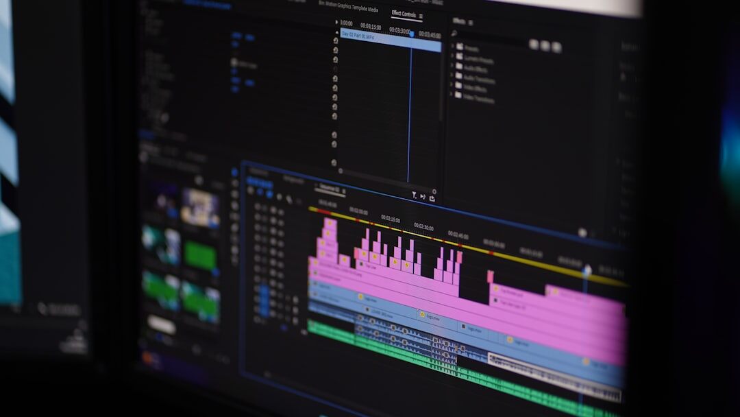 Video editing software timeline on a computer monitor showing multiple video tracks